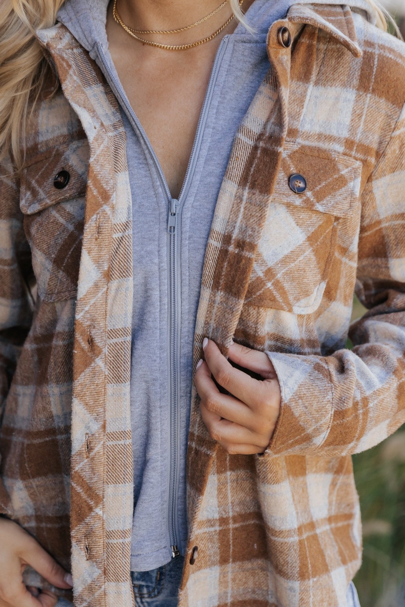 Veste à capuche à carreaux marron