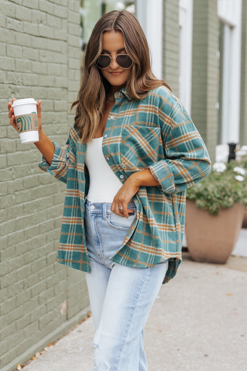 Veste à carreaux verte et orange