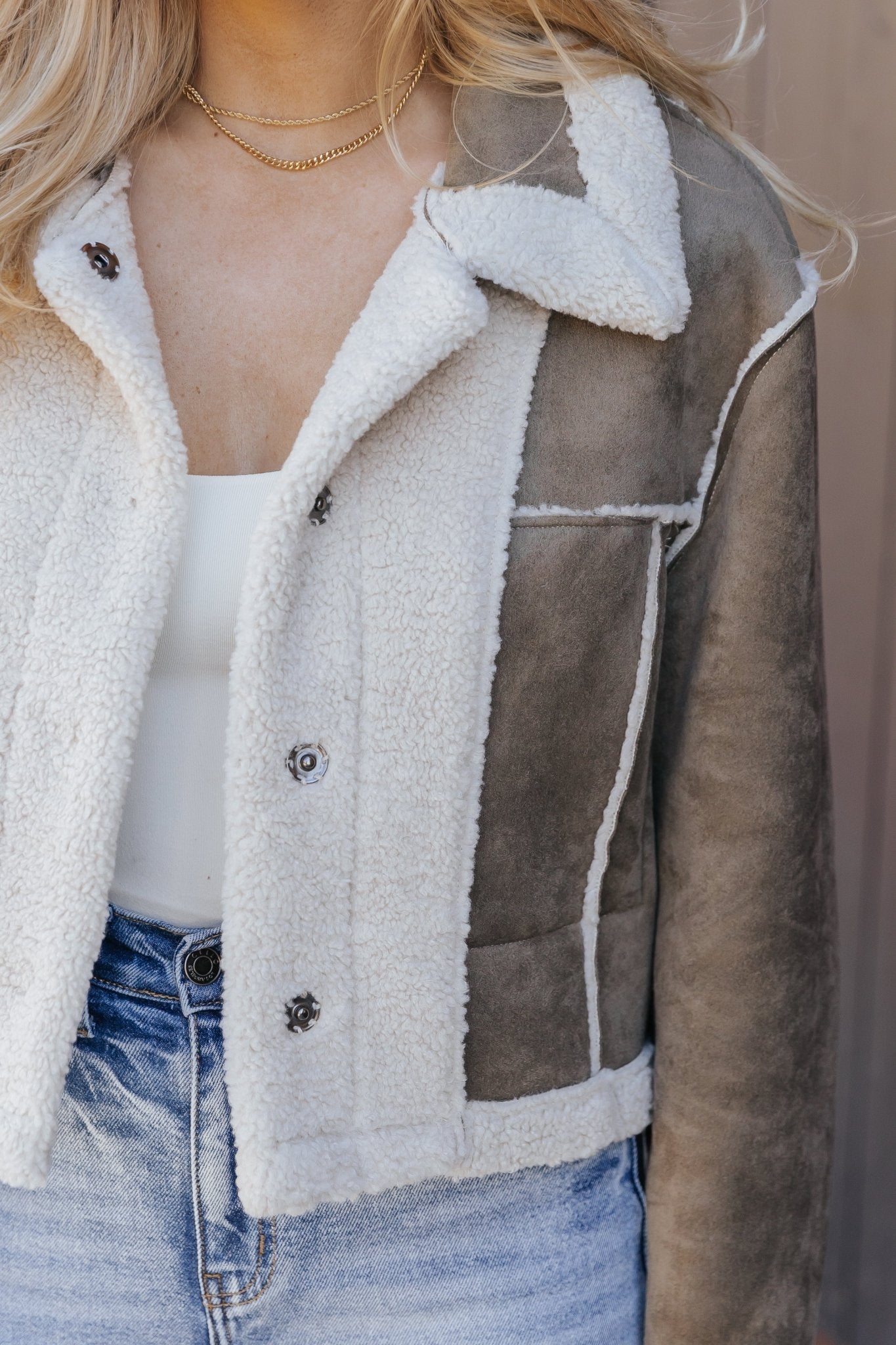 Veste réversible en daim doublée de sherpa olive