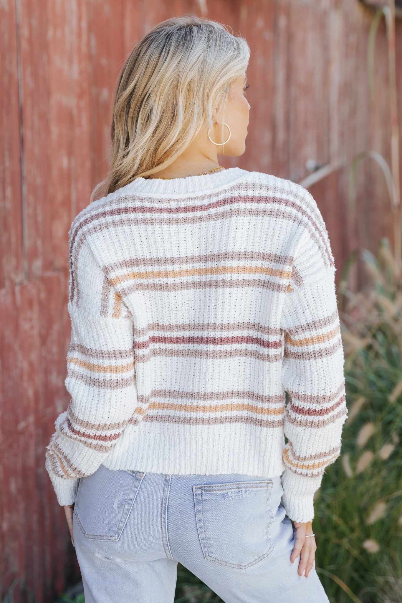 Pull côtelé blanc à rayures multiples